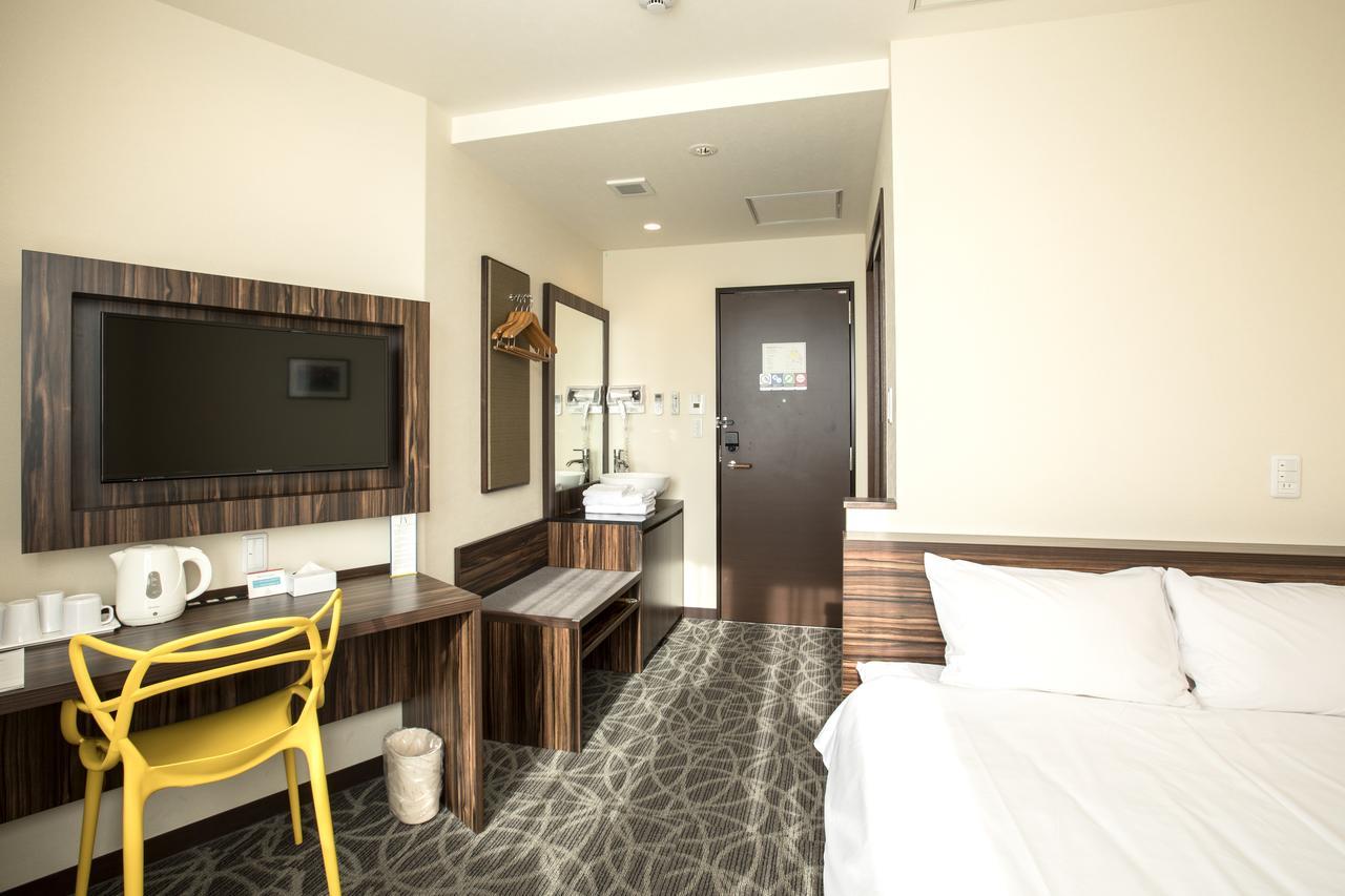 Okinawa Kariyushi Lch. Premium Hotel Naha Szoba fotó