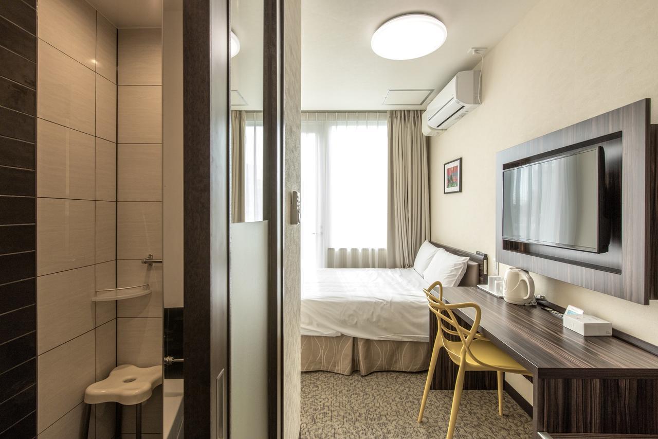 Okinawa Kariyushi Lch. Premium Hotel Naha Szoba fotó
